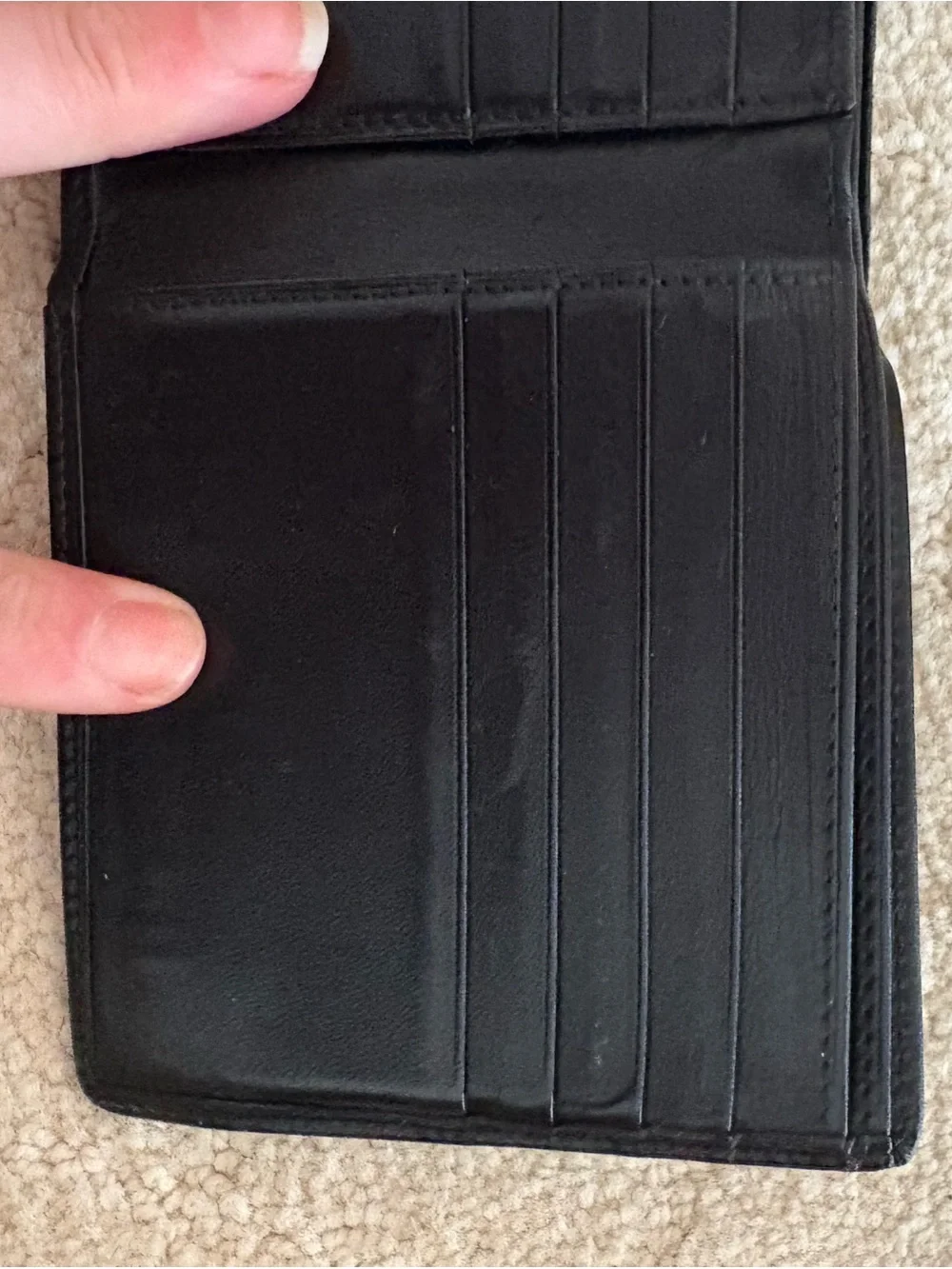 Cartier Black Leather Bi-Fold Card Holder with Gold Emblem